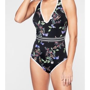 Athleta Gold Coast black floral one piece.